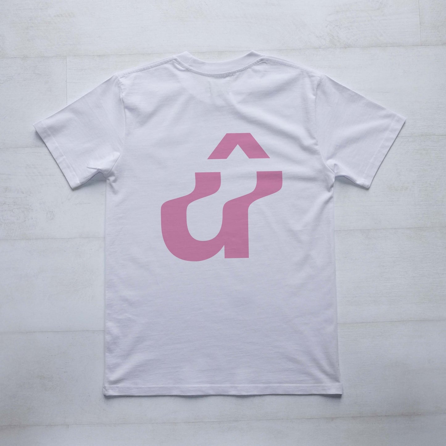 Large Pink û on back of white t-shirt #Warped #Up The Road#